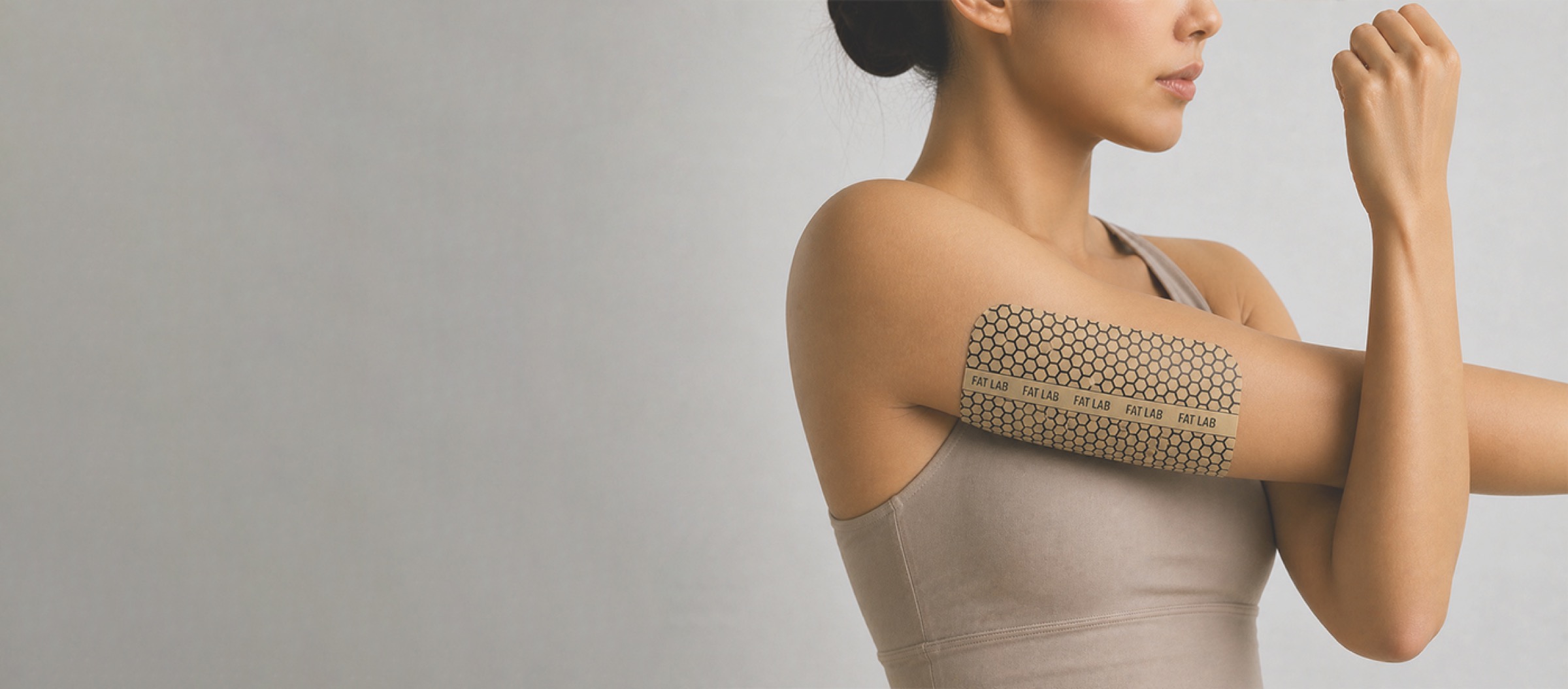 FAT LAB microcirculation patch worn on the upper arm